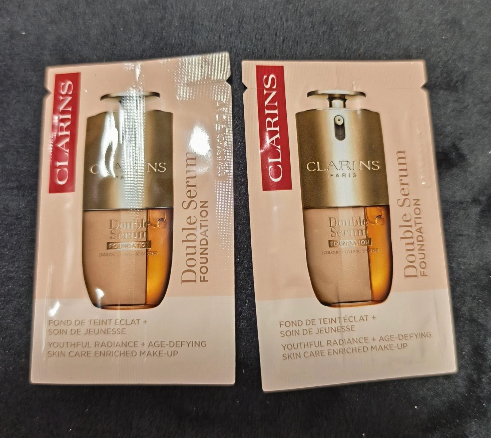 Neceser com batom da Clarins e cremes. – photo 3